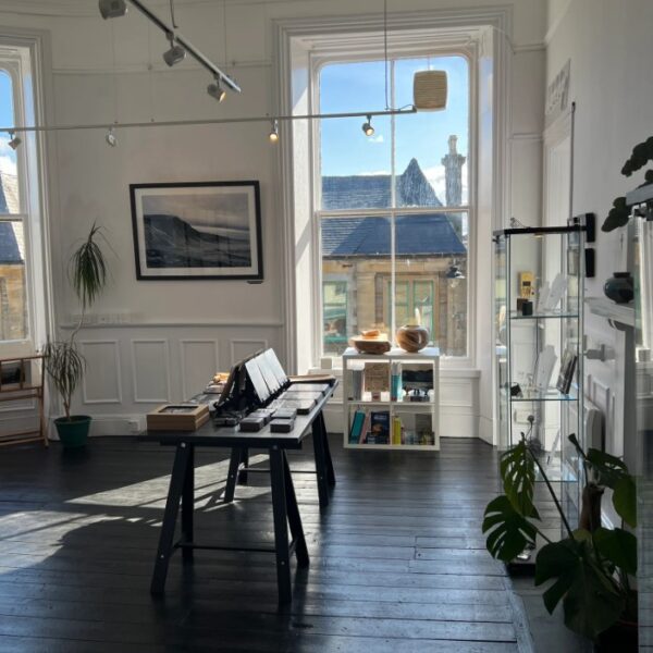 An image showing the Gallery space in Lindsey Gallacher's studio, featuring artwork and items from local makers and artists