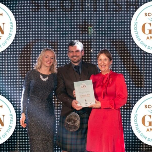 Claire and Martin from Dunnet Bay Distillery receiving an award at the Gin Awards 2019