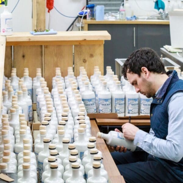 Martin from Dunnet Bay Distillery bottling their gin