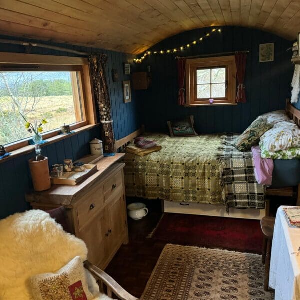Fiddler's Green Birkenshaw Shepherd's Hut, interior view with bed