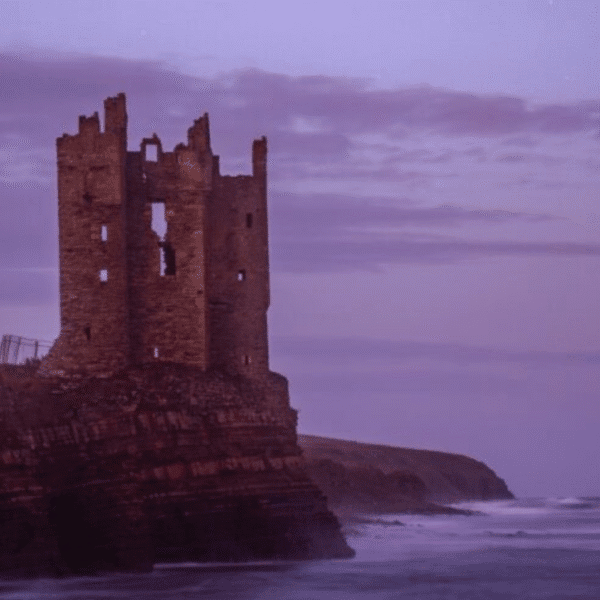 Keiss Castle with a purple sky from the sunset