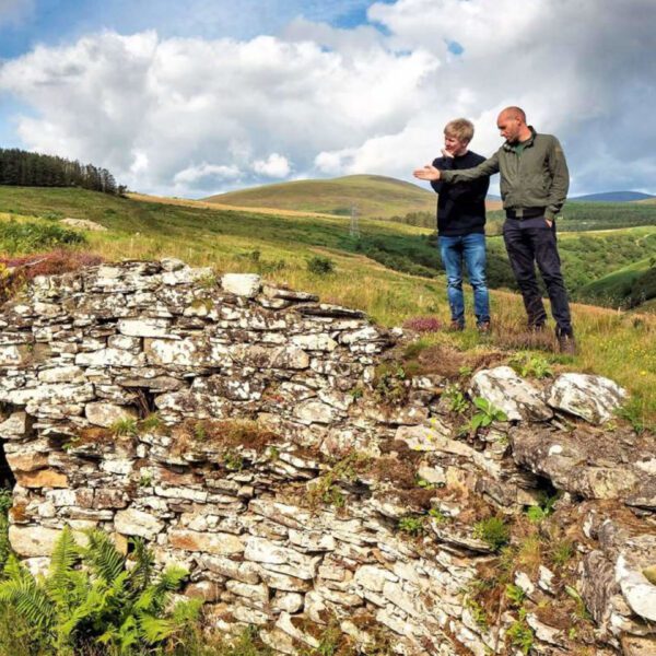 Two men stand on top of Ousdale Broch