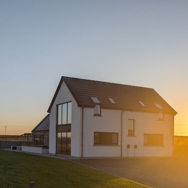 Flotnur Hus exterior during sunset