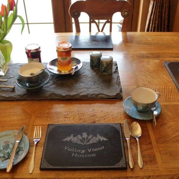 Breakfast table with place settings at Valleyview House B&B